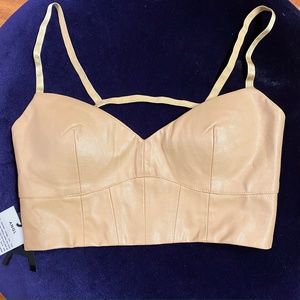 ANGL faux leather strappy nude crop top